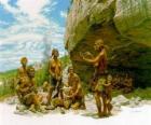 Группа людей неандертальского под защитой рок жилья, то лица, осуществляющий различные виды деятельности: chartting камни, другие подготовк&amp;